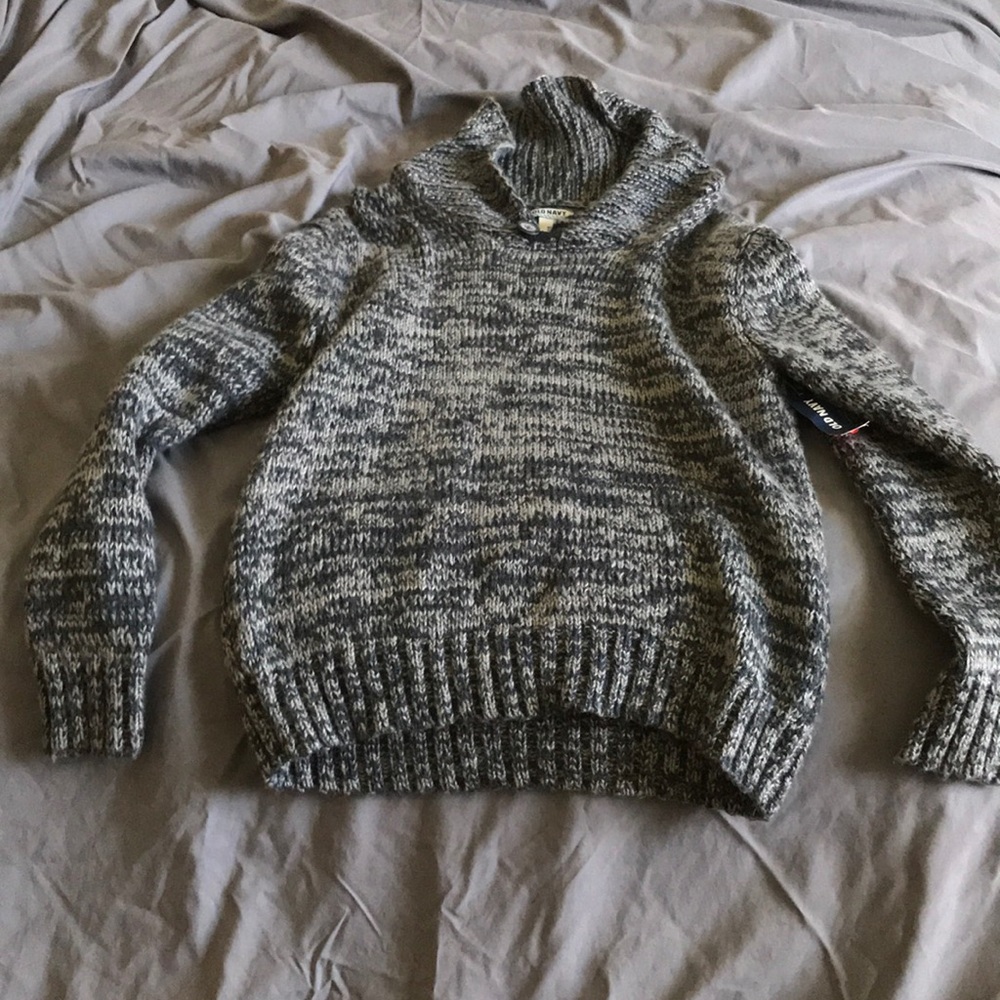 It’s a gray sweater wore mostly during the winter
